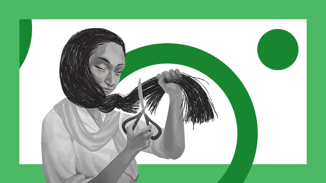 Woman cutting her hair